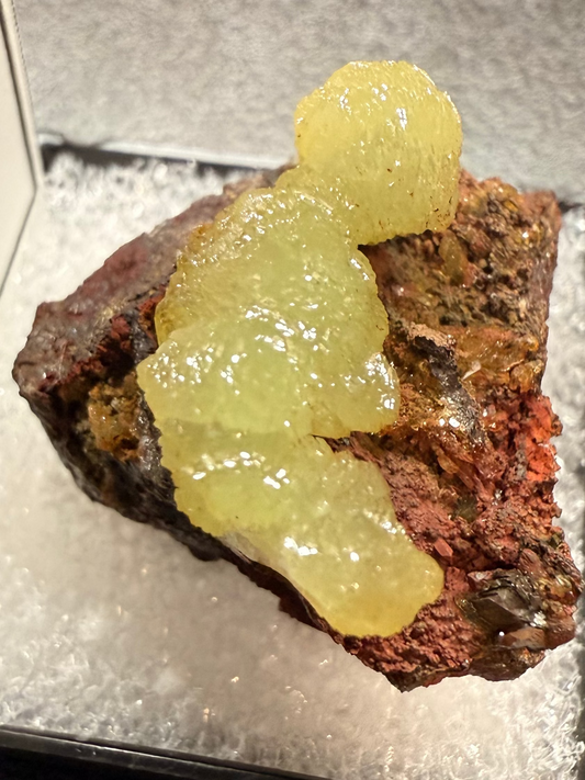 Mineral sample on a light surface